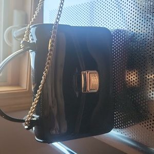 Black crossbody bag with chain. Mini Size